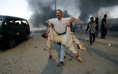 DOBLE BOMBAZO EN MERCADO IRAQUI; 65 MUERTOS