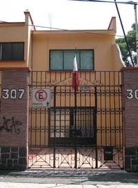 Casa con el número 307 de la calle de Sevilla en la colonia Portales, delegación Benito Juárez del Distrito Federal, supuesta sede de la empresa Mil Acres