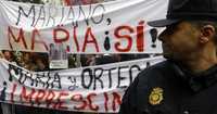 Protestas bajo vigilancia policial contra el líder máximo del Partido Popular, ayer en Madrid