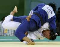La cubana Yalennis Castillo no pudo contener los embates de la china Yang Xiuli, durante su encuentro de judo. Al final, la anfitriona obtuvo el oro y la isleña la plata