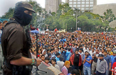 Libertad incondicional de presos de Atenco, exigen miles Libertad incondicional de presos de Atenco, exigen miles