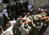 Luto de mujeres palestinas durante el funeral de Mahdy Abu Alkare, militante de Jihad Islámica abatido por soldados israelíes
