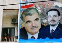 Al frente de una casa en el campo de refugiados palestinos Nahr al-Bared, en Trípoli, la imagen del primer ministro libanés asesinado Rafiq Hariri, y su hijo, Saad (a la derecha), actual líder de la mayoría parlamentaria