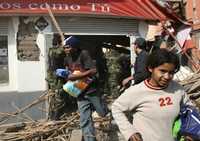 Pobladores de un barrio de Pisco saquean una tienda ante la nula llegada de asistencia a ese sector