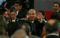 El presidente Felipe Calderón sonríe tras dar a conocer los resultados del examen Enlace