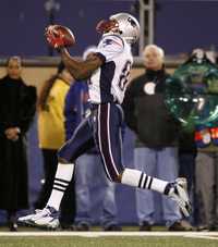 Momento en que Randy Moss supera la marca de recepciones para touchdown