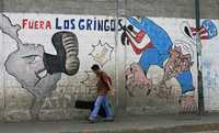 Pinta en una calle de la capital venezolana contra el gobierno de Estados Unidos y su política intervencionista en América Latina
