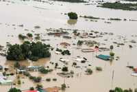 Aspecto de la inundación de la zona agrícola y de unas 300 viviendas en Ojinaga, Chihuahua, a causa de la ruptura del bordo de una presa