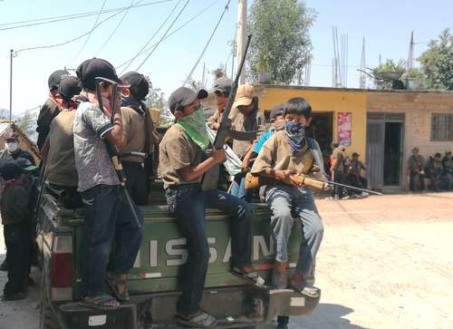 Niños habitantes de José Jaoquín de Herrera, Guerrero, se integraron a la CRAC-PF para hacer frente a la delincuencia.