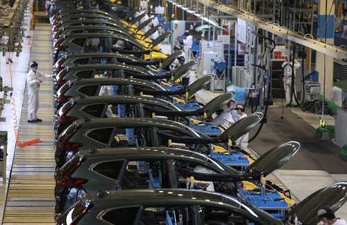 Línea de ensamblaje en la planta automotriz de Dongfeng Honda, en la ciudad de Wuhan. La economía de China repuntó en el primer trimestre.