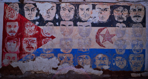 Mural con rostros de desaparecidos saharauis.  AFAPREDESA