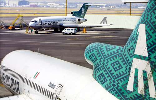 Unions drop embargo lawsuits against Mexicana Photo