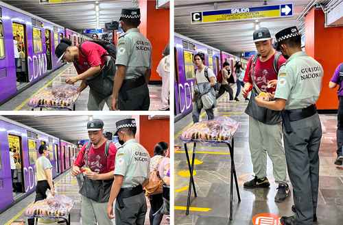 Un agente de la Guardia Nacional disfruta el dulce típico dentro del Metro.