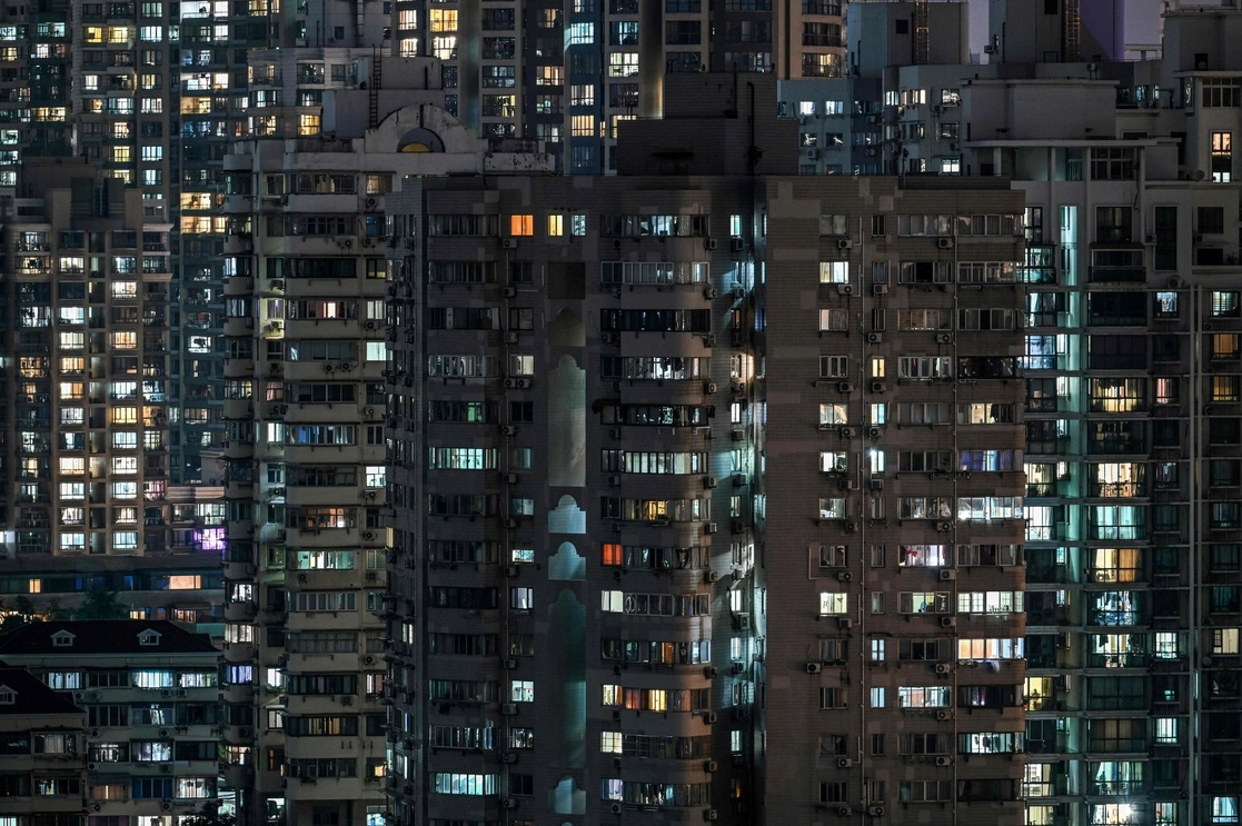 Unidades residenciales en el distrito Jing’an de Shanghai, durante el confinamiento de covid-19, el 21 de abril de 2020. Foto Afp