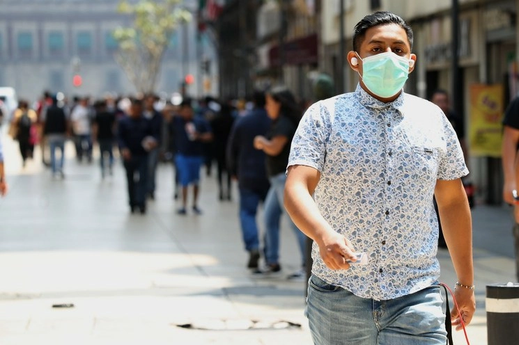 Capitalinos con tapabocas por la pandemia del Covid-19. Foto María Luisa Severiano