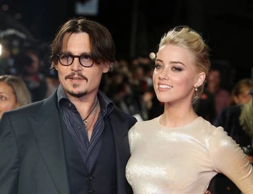 La imagen corresponde al estreno de ‘Los diarios del ron’, donde actuaron Johnny Depp y Amber Heard en 2011. Foto Ap