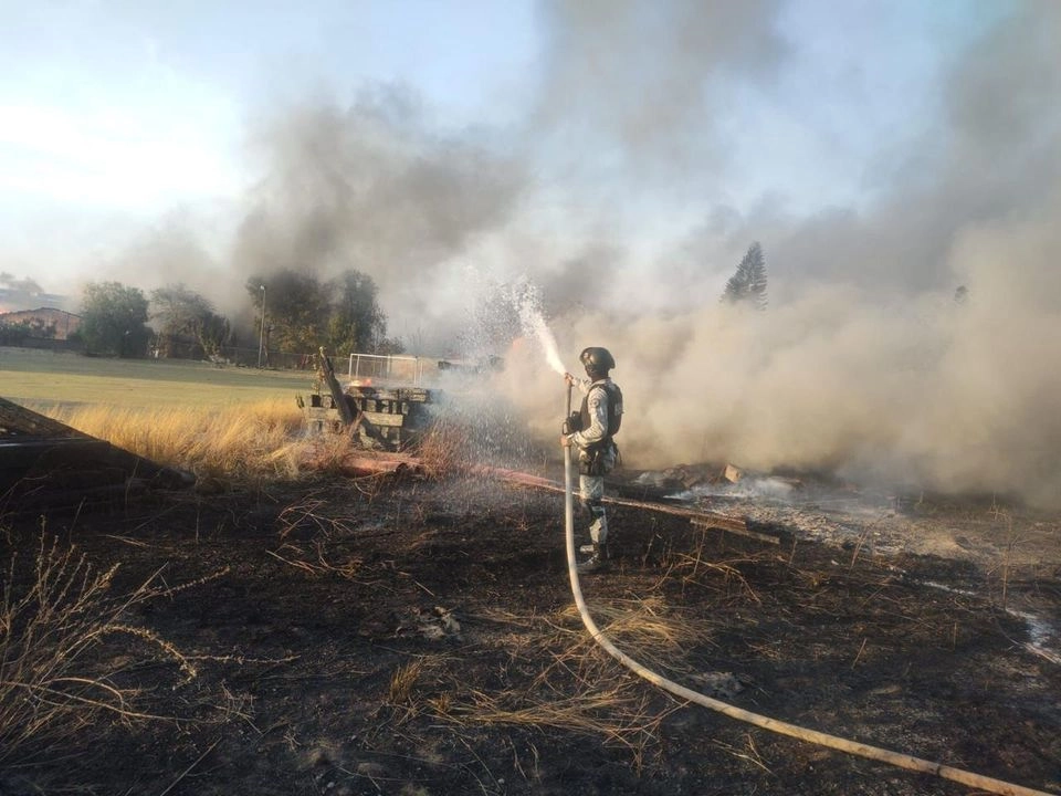 La Guardia Nacional informó que puso en marcha el Plan D -III-E, tras registrarse un incendio en una fábrica de aerosoles, en el Municipio de Tlaquepaque, Jalisco. Foto