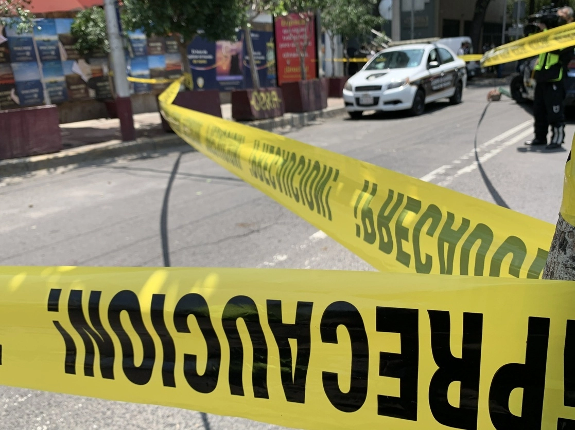El hijo de los políticos panistas entró a la farmacia y asesinado cuando abordó su camioneta Jepp con placas GLZ 696 D. Foto La Jornada / archivo