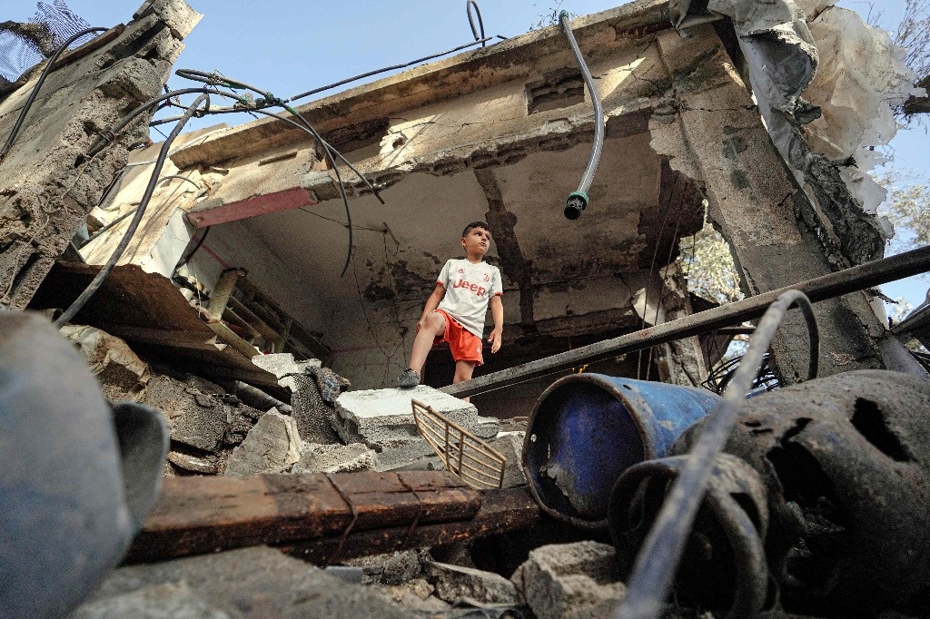 Simultaneous assaults in Gaza go away 38 lifeless