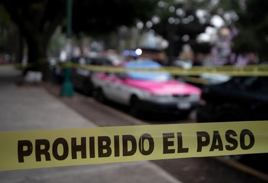 Escena de una ejecución en la alcaldía Miguel Hidalgo, en la Ciudad de México. Foto Alfredo Domínguez / Archivo
