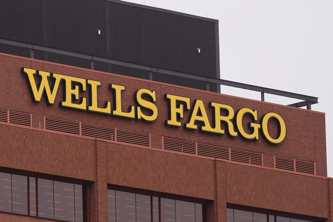 Well Fargo & Co, JP Morgan Chase & Co, Citigroup y Bank of America son los cuatro bancos de consumo más grande de EU. Foto Ap