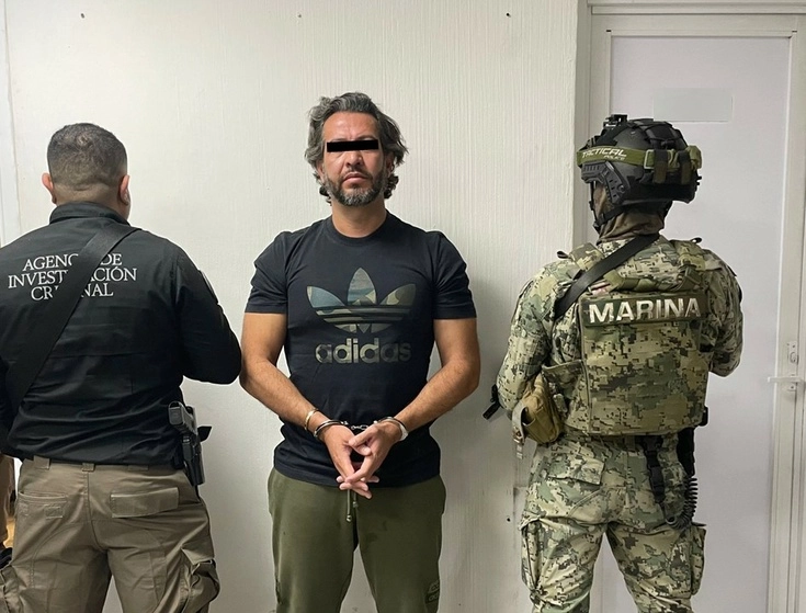 Norberto "N", alias "El Socialitos" tras su captura. Foto Semar
