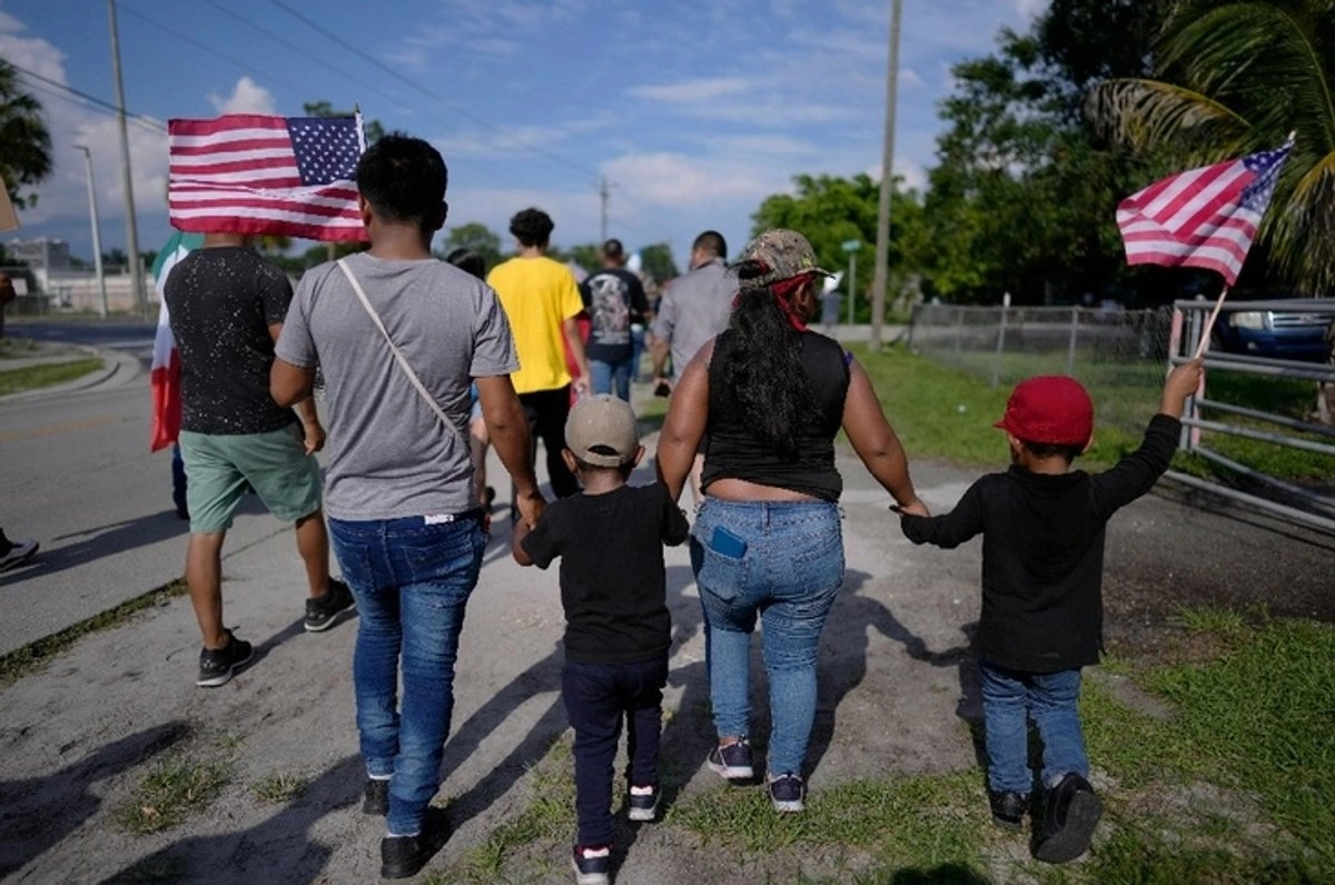Familias migrantes en Florida en imagen de archivo. 