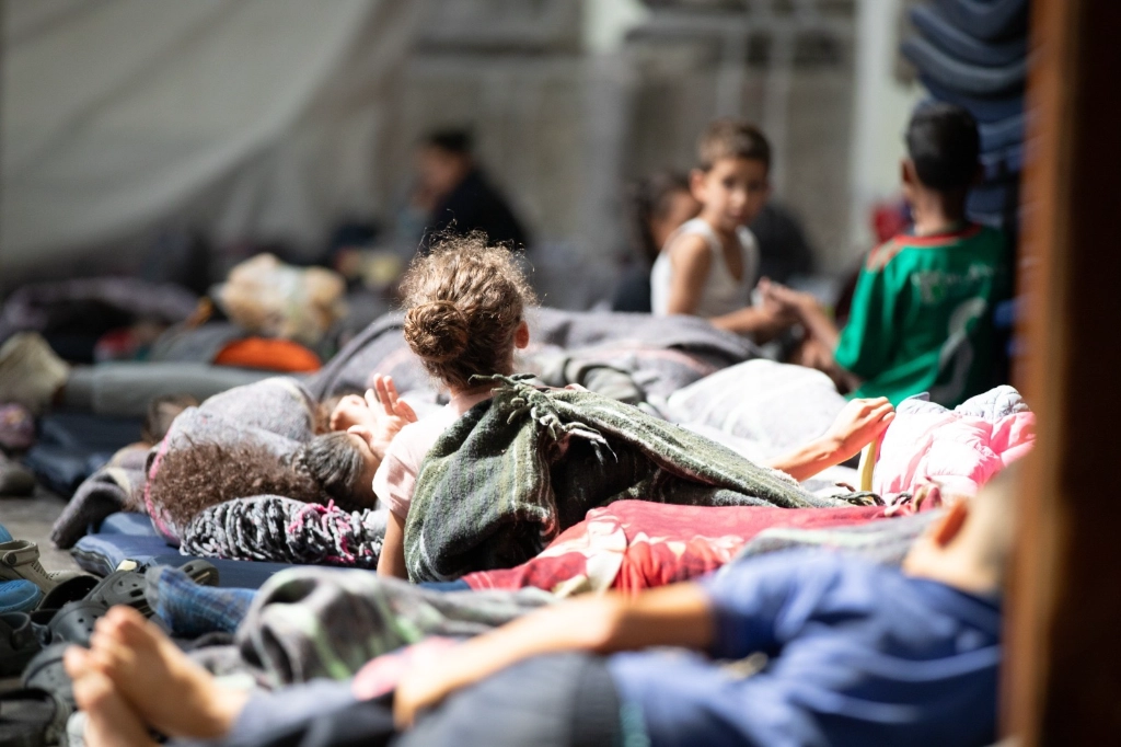 Migrantes en la plaza de la Soledad. Fotos Pablo Ramos