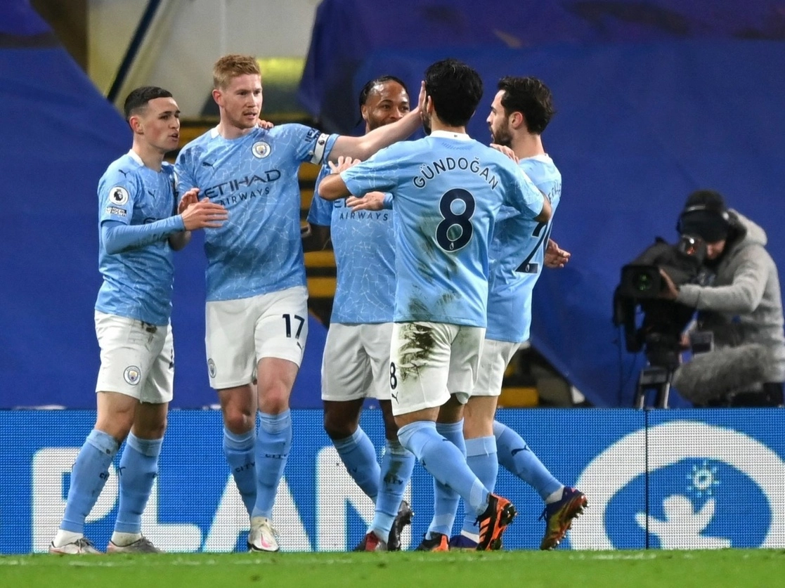 Jugadores del Manchester City celebran la anotación de Phil Foden ante Chelsea. Foto Ap