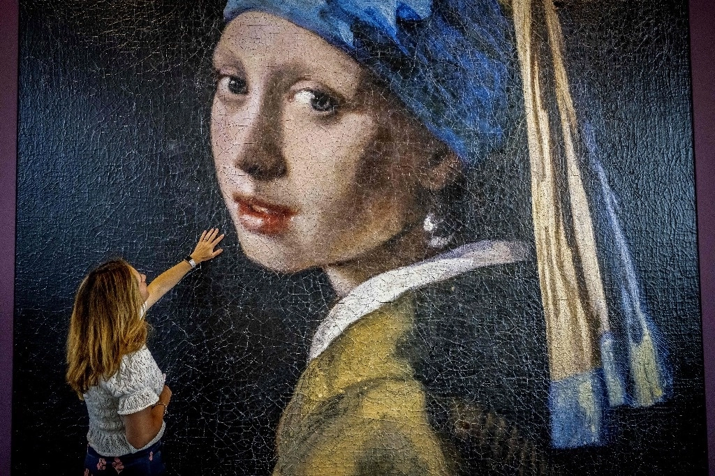 Impresión en tercera dimensión de cuatro metros de altura del cuadro de Johannes Vermeer. Foto Afp