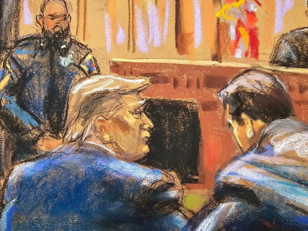 Donald Trump se convirtió hoy en el primer ex presidente estadunidense en la historia en ser sujeto a un juicio criminal, el primero de los cuatro procesos en esa materia que tiene en su contra. Foto Pool, vía Ap