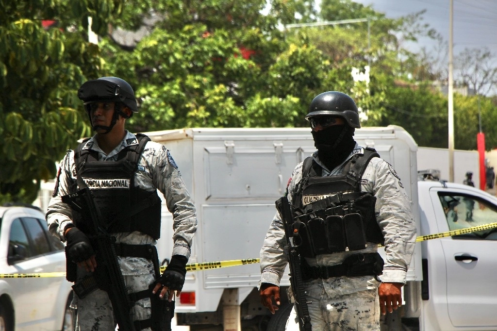 Elementos de la GN tras un ataque armado en Tuxla Gutiérrez, Chiapas. Foto Arturo Mijangos Moreno / Cuartoscuro / La Jornada