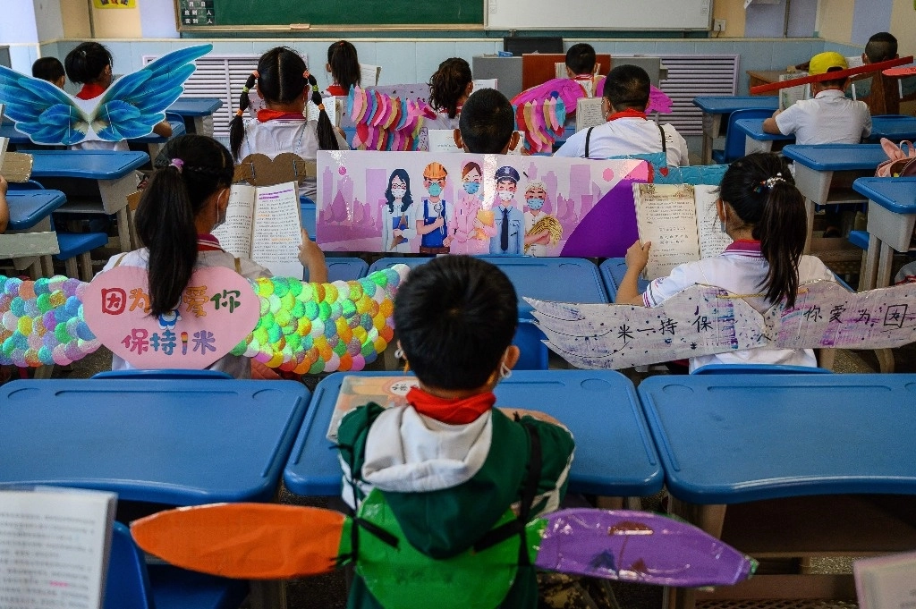 Alumnos de una escuela primaria en China en imagen de archivo. Foto Afp