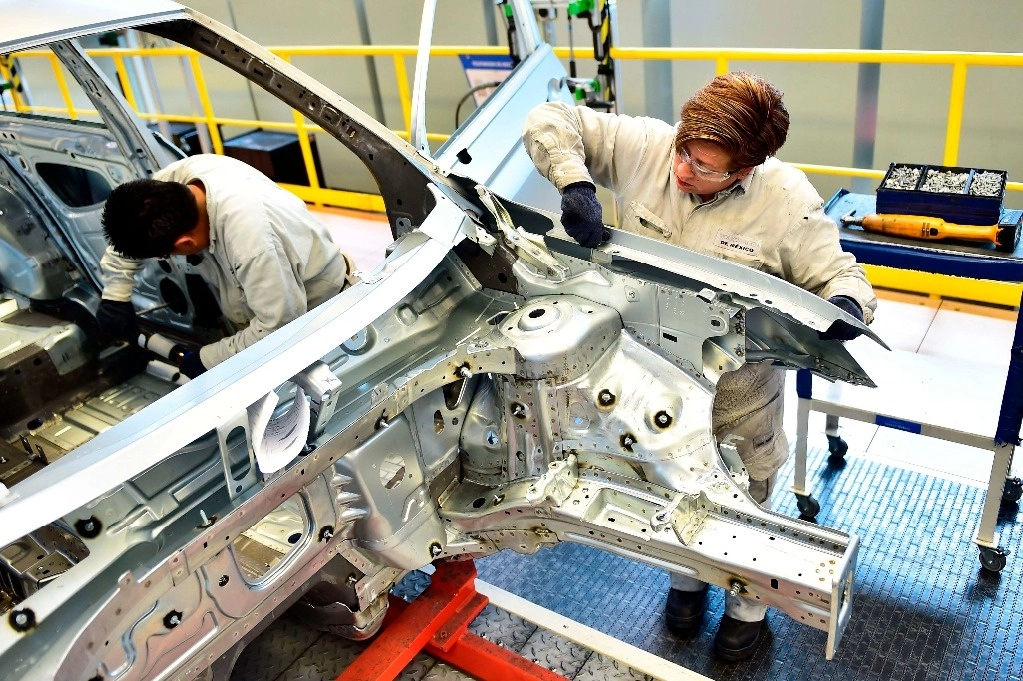 Ante el relevo presidencial en EU el cambio en las reglas de origen en el sector automotor está sobre la mesa del T-MEC. Foto Afp
