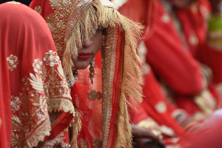 Una joven india musulmana participa en una boda colectiva en Ahmedabad. Foto AFP / Archivo 