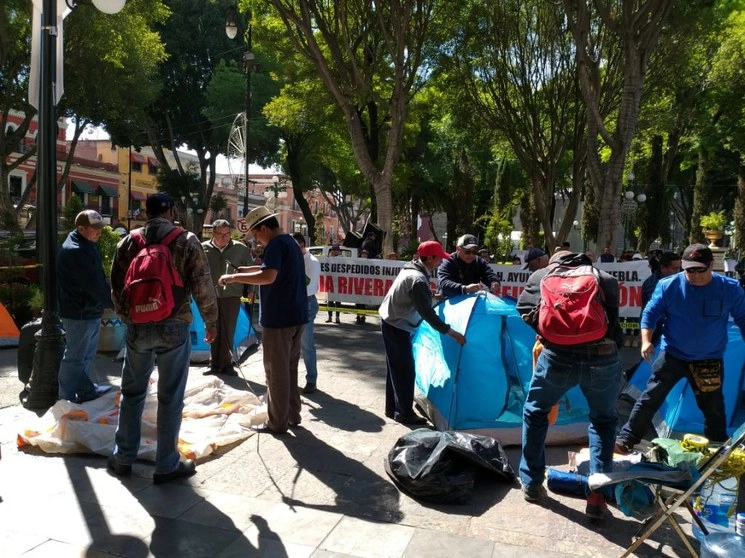 De los 27 trabajadores despedidos, 20 son mujeres. Foto Rafael García Otero