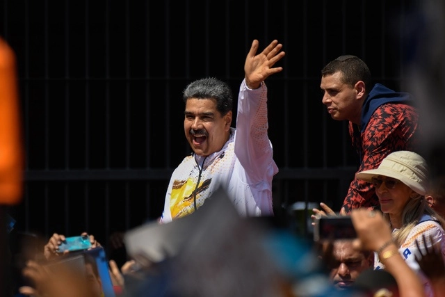 El presidente de Venezuela, Nicolás Maduro (c). Foto Xinhua