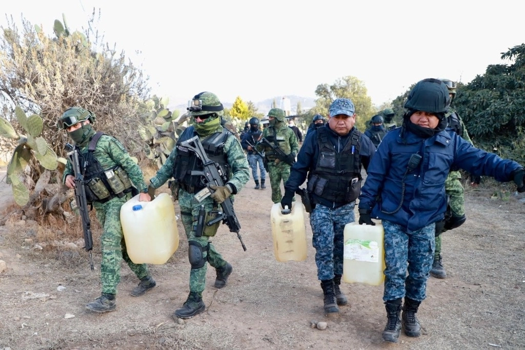 Habitantes de Cuautepec de Hinojosa intentaron evitar el cateo en un domicilio de la colonia Tepantitla. Foto Secretaría de Seguridad Pública de Hidalgo / Archivo
