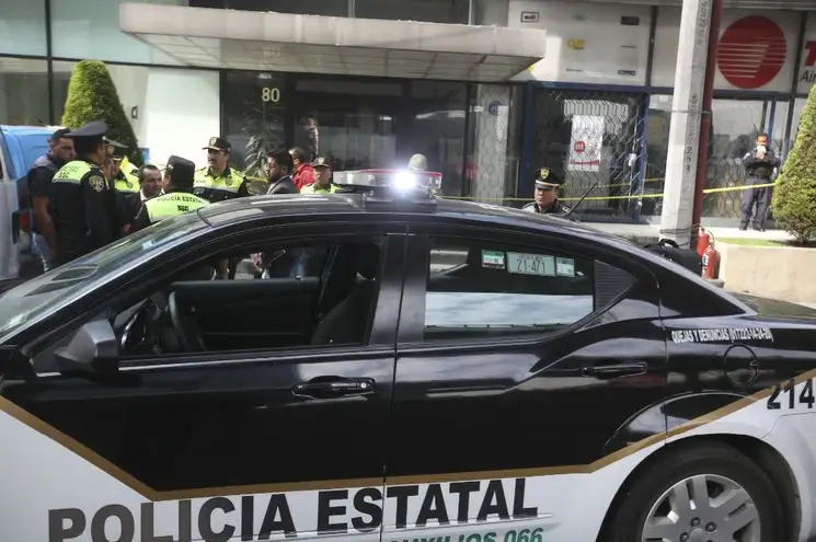 Autoridades de 22 municipios mexiquenses se unieron para hallar a los responsables de dejar cuerpos embolsados colgando de un puente en Toluca. Foto Cuartoscuro / Archivo