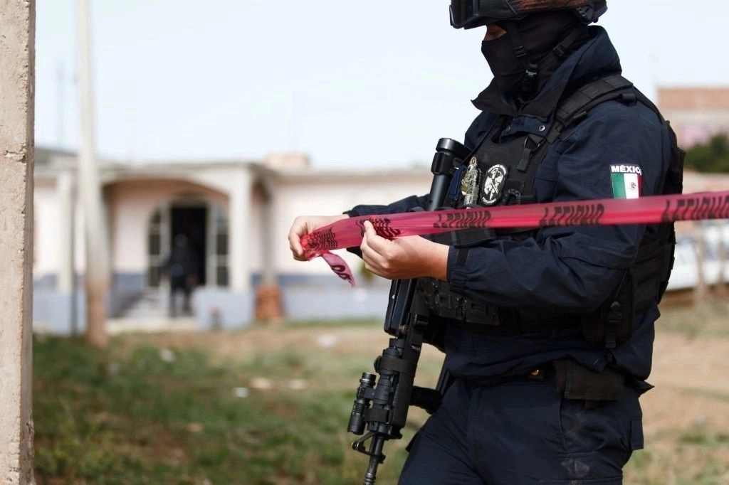 Imagen de archivo de un policía cercando el área donde se cometió un delito. Foto