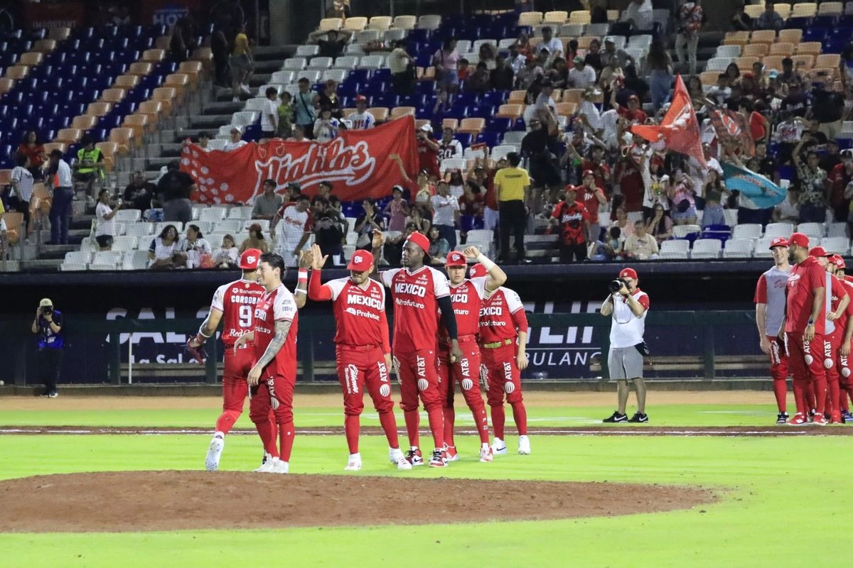 Con cuatro carreras en tres entradas, los Diablos Rojos del México (48-20) tomaron el control del juego y gracias al trabajo de los relevistas colgaron siete ceros consecutivos para vencer a los Tigres. Foto