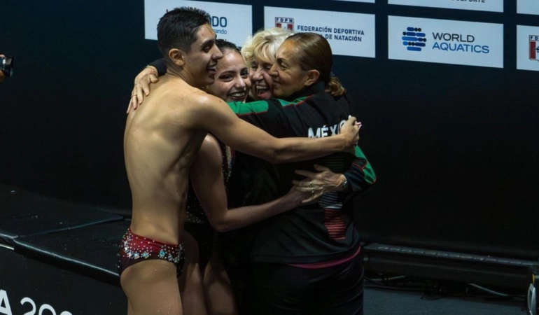 Diego y Camila se colgaron la medalla de oro al sumar 279.5042 puntos en dueto mixto rutina libre. Foto Proporcionada por el COM