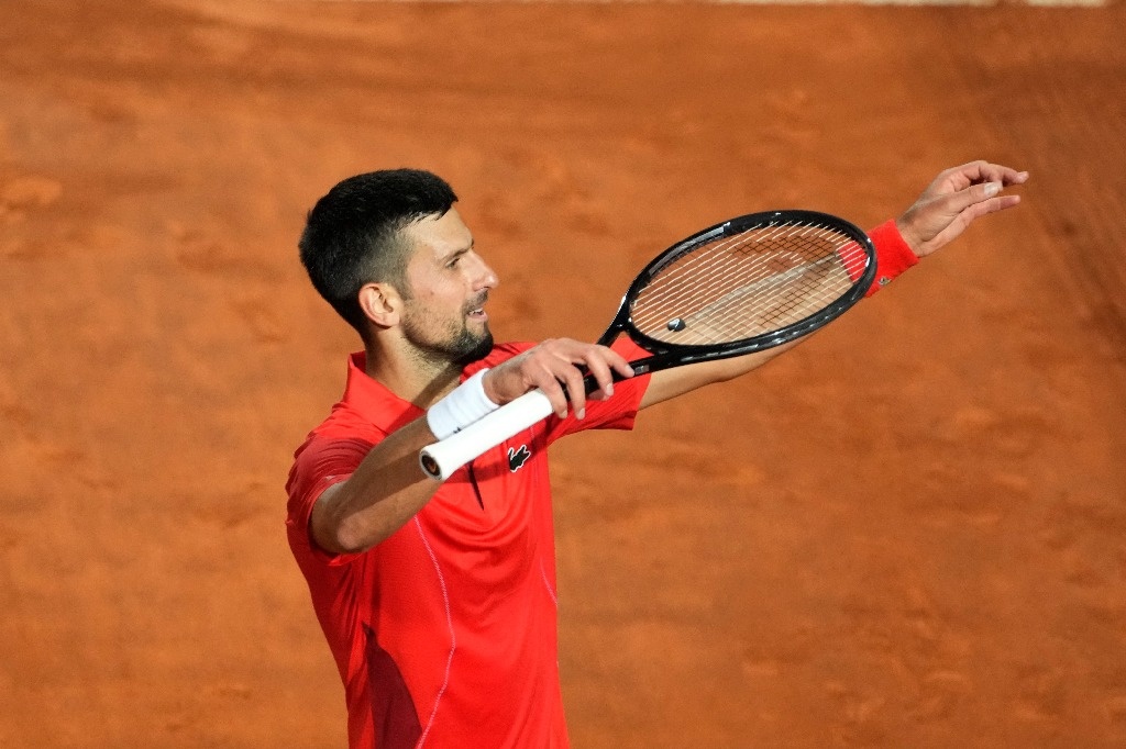Djokovic begins in Rome with victory however is hit by a bottle