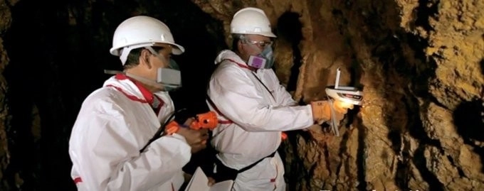 Foto de archivo de dos mineros trabajando. Imagen tomada de @SE_mx