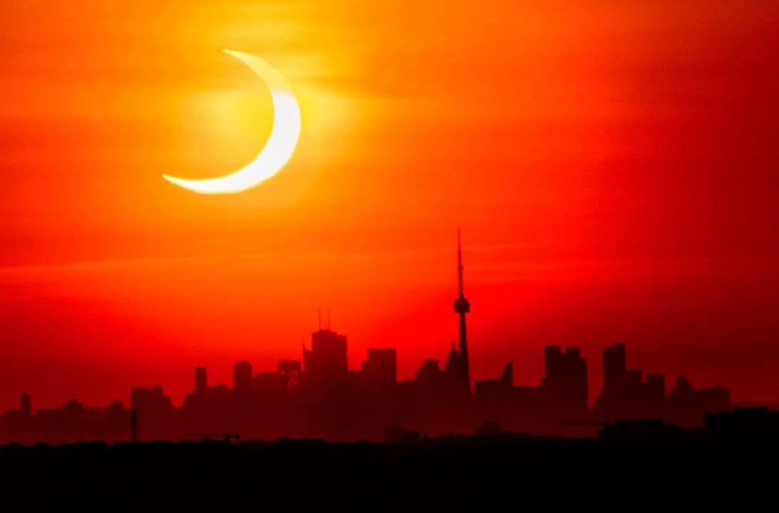 Un eclipse anular se observa desde Toronto, Canadá, el 10 de junio de 2021. Foto Frank Gunn / The Canadian Press vía 