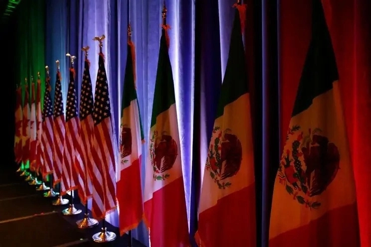 Banderas de Canadá, Estados Unidos y México, en imagen de archivo. Foto Ap