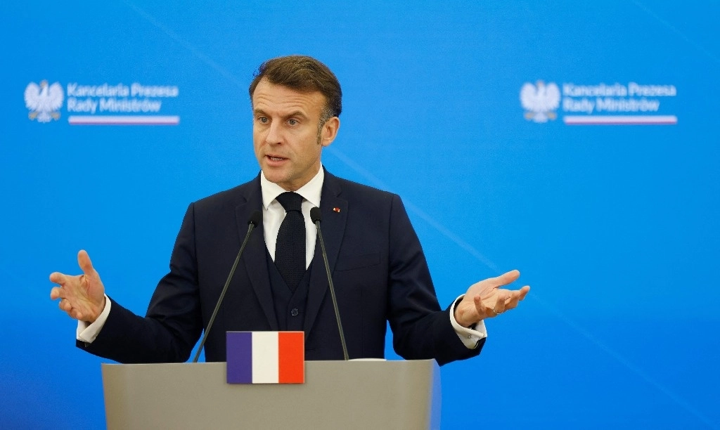 Emmanuel Macron, presidente de Francia, en conferencia de prensa conjunta con el primer ministro de Polonia, Donald Tusk. en Varsovia, el 12 de diciembre de 2024. Foto Afp 