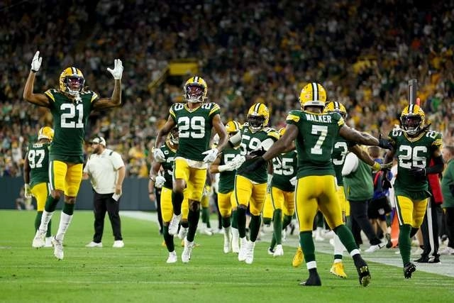 Jugadores de Green Bay celebran el triunfo ante los Osos de Chicago. Foto Afp