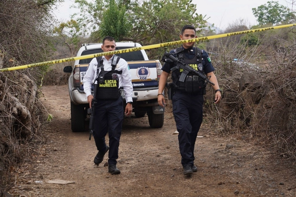 Dos hombres fueron localizados con impactos de bala en la cabeza en la colonia Ciudad Jardín, en Morelia, Michoacán. Foto Cuartoscuro / Archivo 