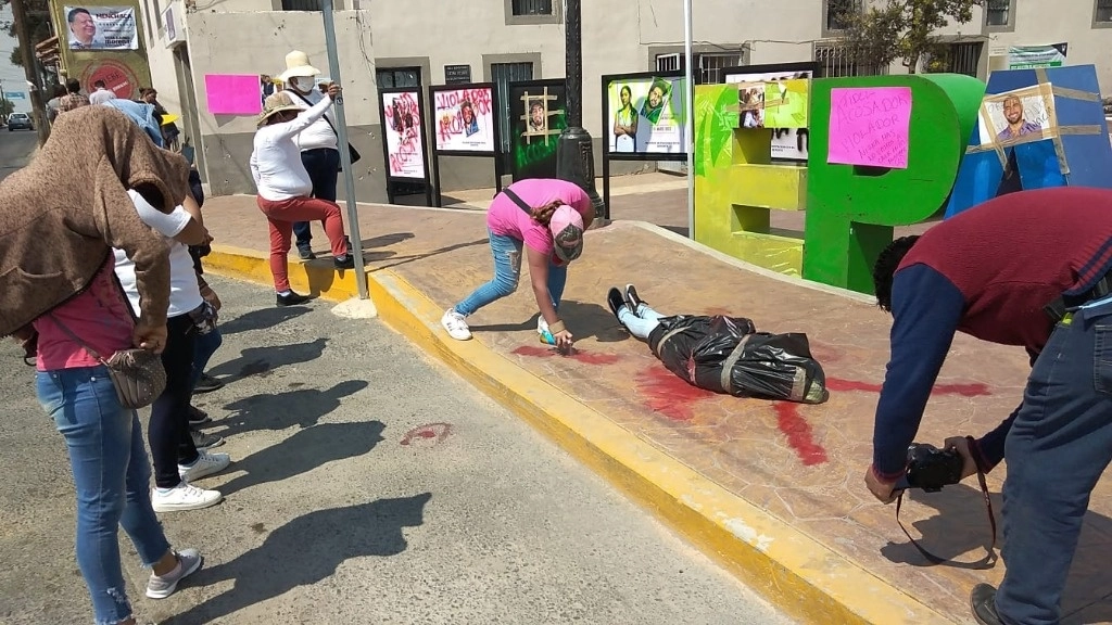 Activistas durante manifestación contra feminicidio y agresiones sexuales hacía las mujeres en Hidalgo. Foto Juan Ricardo Montoya